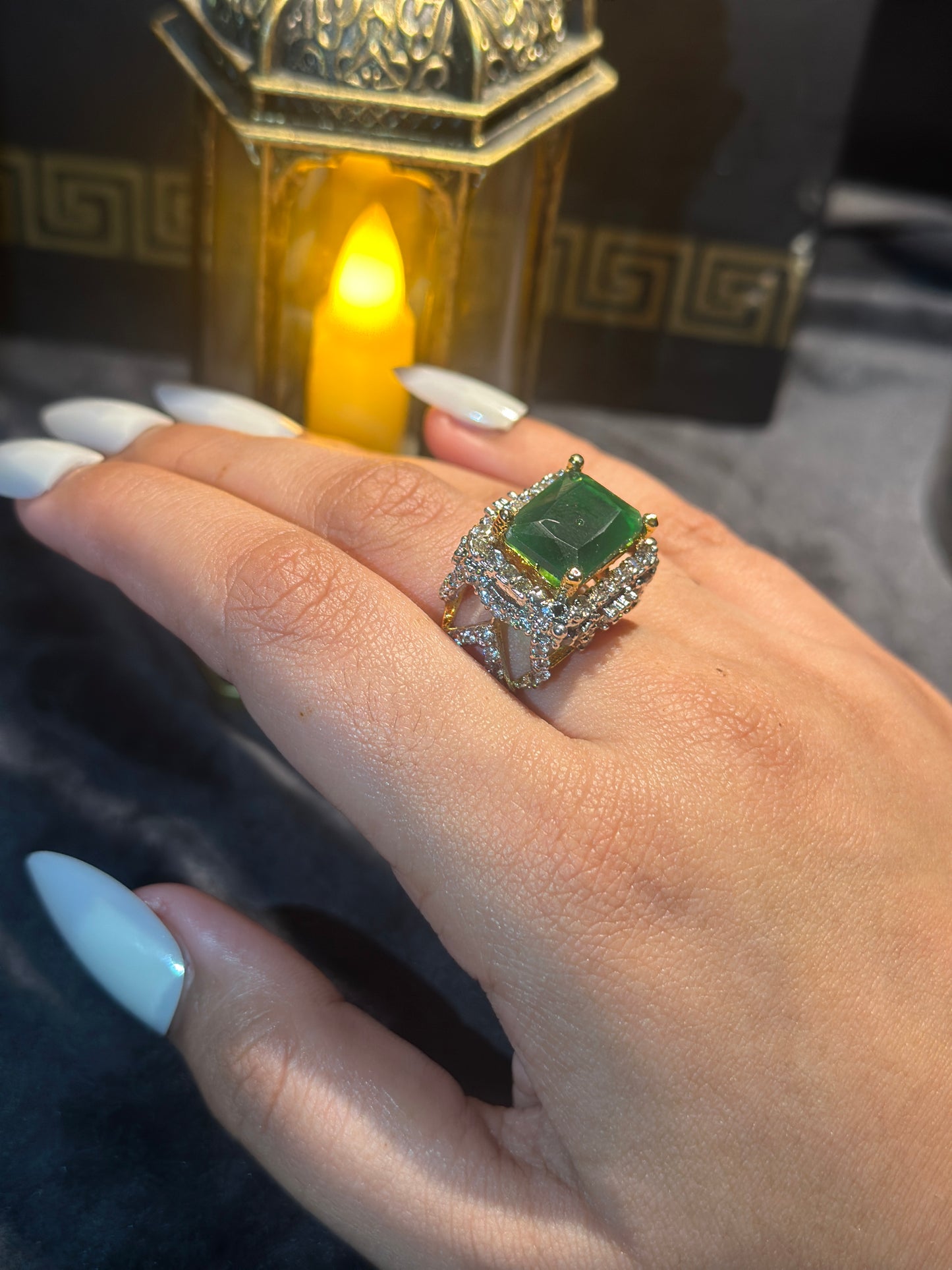Emerald and black ring