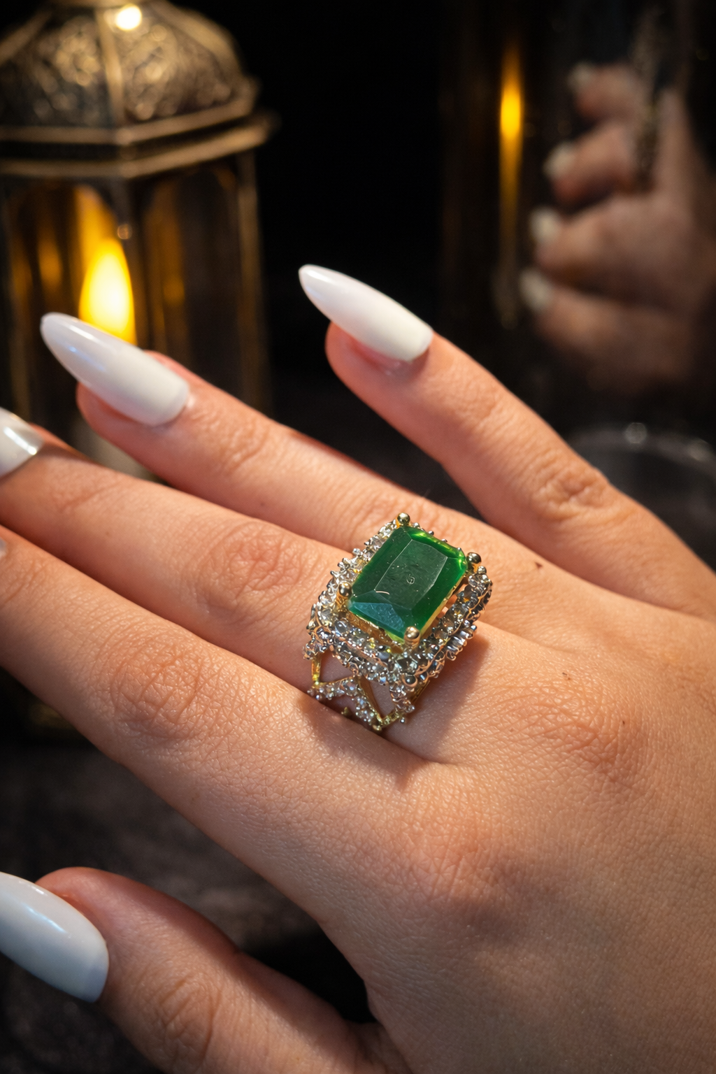 Emerald and black ring